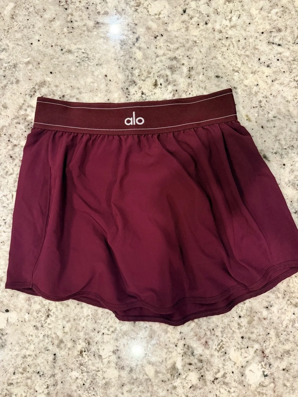 ALO Yoga Maroon Performance Skort with White Stripe